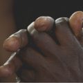 man praying hands mormon