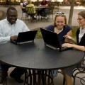 People doing Family Search Indexing in a park