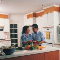 couple preparing salad together