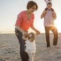 family walking on beach