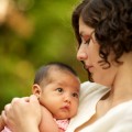 mother holding infant