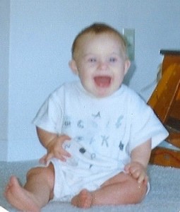 Baby  with Down Syndrome smiling