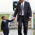 Father and son walking to General Conference