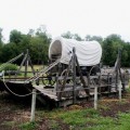 covered wagon sitting on raft at Nauvoo, Illinois