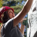 woman climbing mountain