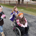 children with one child in a wheelchair