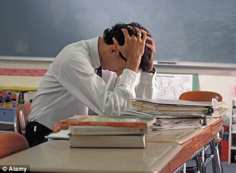Male teacher stressed out