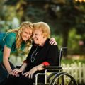 women wheelchair old friend