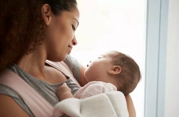 woman holding baby