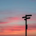 directions sign sunset decision