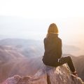 woman hiking mountain peak