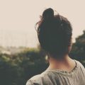 woman pondering thinking overlook