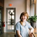 woman smiling sitting