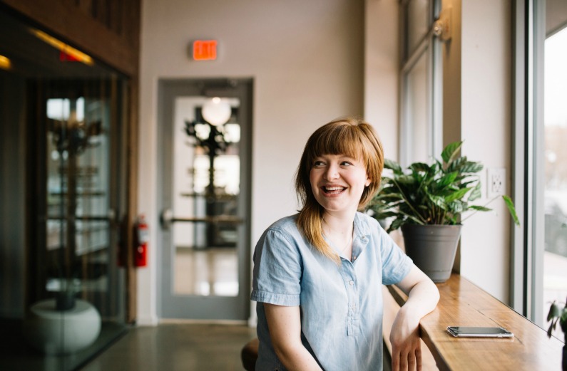 woman smiling sitting