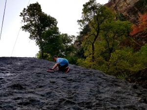 Bratcher crossing the face of Sliding Rock